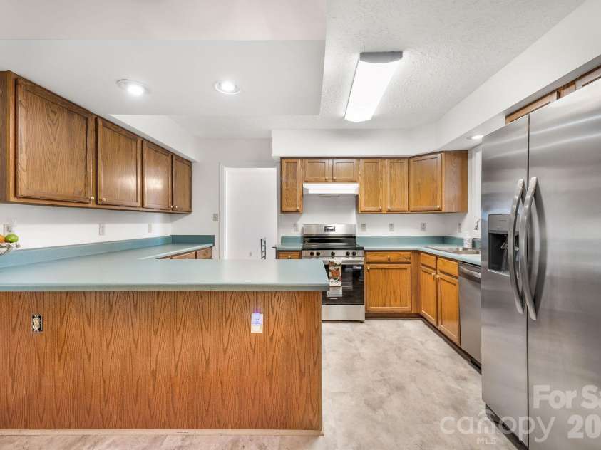 67 & 69 Allman Hill Road, Weaverville, NC 28787.  MLS# CAR4427443, YatesRealty ID 55771. Breakfast bar in Kitchen