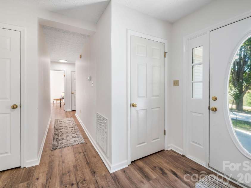 67 & 69 Allman Hill Road, Weaverville, NC 28787.  MLS# CAR4427443, YatesRealty ID 55771. Hall to bedrooms