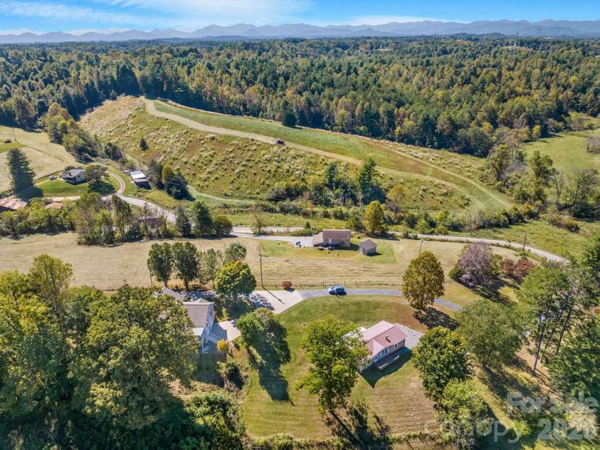 67 & 69 Allman Hill Road, Weaverville, NC 28787.  MLS# CAR4427443, YatesRealty ID 55771. Looking fairly westward