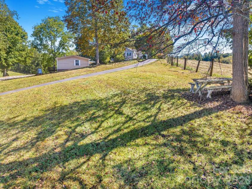 67 & 69 Allman Hill Road, Weaverville, NC 28787.  MLS# CAR4427443, YatesRealty ID 55771. Shady spot for a picnic