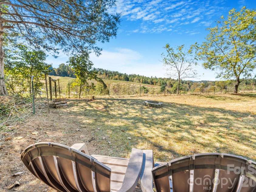 67 & 69 Allman Hill Road, Weaverville, NC 28787.  MLS# CAR4427443, YatesRealty ID 55771. Sit by the fire pit