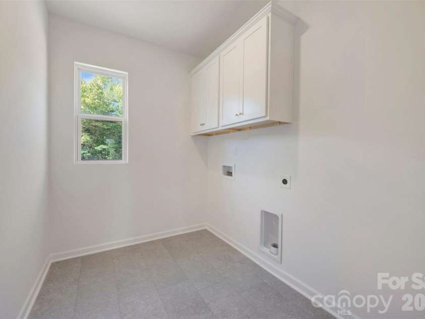 211 Amber Glen Drive, Locust, NC 28097.  MLS# CAR4351400, YatesRealty ID 5578. Laundry room