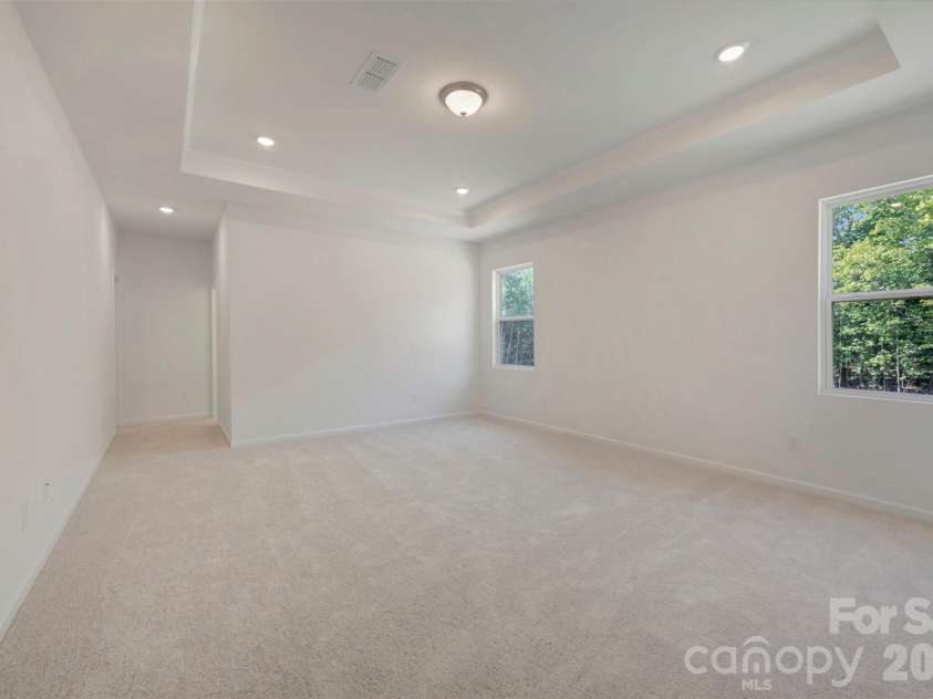 211 Amber Glen Drive, Locust, NC 28097.  MLS# CAR4351400, YatesRealty ID 5578. Owner's suite