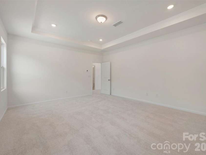 211 Amber Glen Drive, Locust, NC 28097.  MLS# CAR4351400, YatesRealty ID 5578. Owner's suite