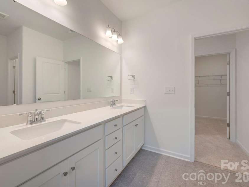 211 Amber Glen Drive, Locust, NC 28097.  MLS# CAR4351400, YatesRealty ID 5578. Owner's suite