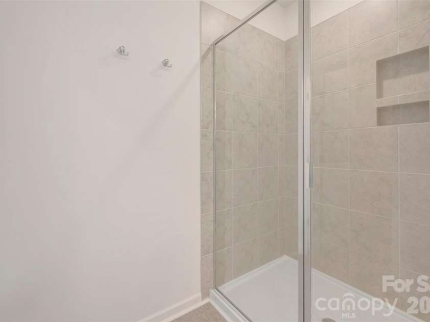 211 Amber Glen Drive, Locust, NC 28097.  MLS# CAR4351400, YatesRealty ID 5578. Owner's suite