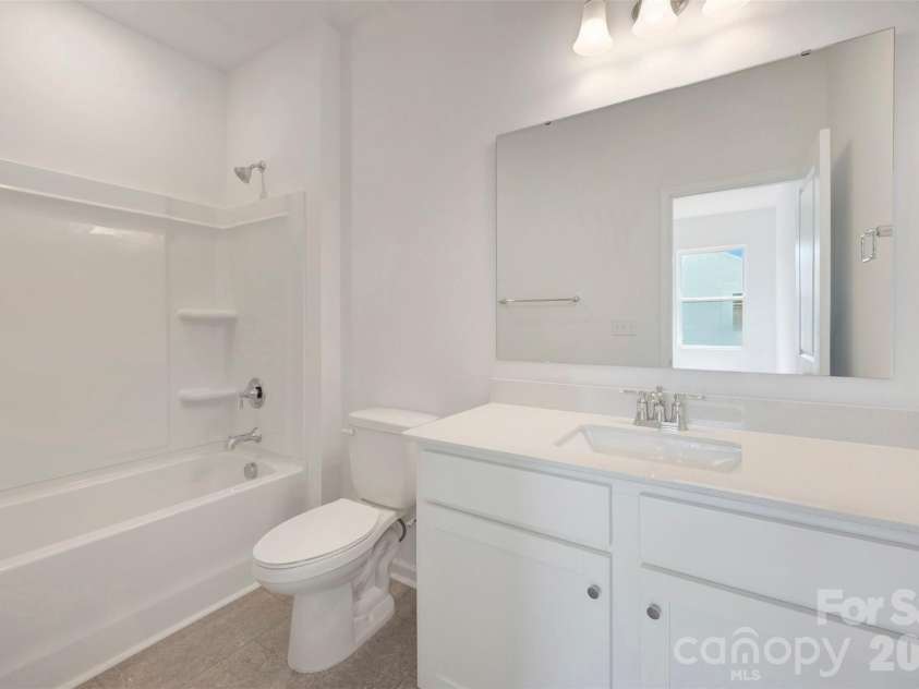 211 Amber Glen Drive, Locust, NC 28097.  MLS# CAR4351400, YatesRealty ID 5578. Secondary bathroom