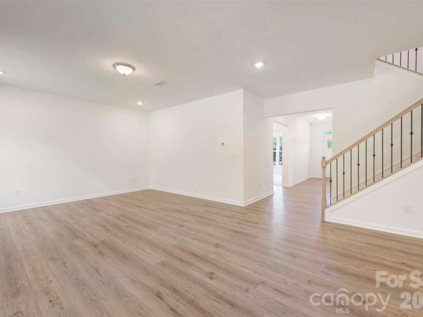 211 Amber Glen Drive, Locust, NC 28217.  MLS# CAR4351400, YatesRealty ID 5578. Family room