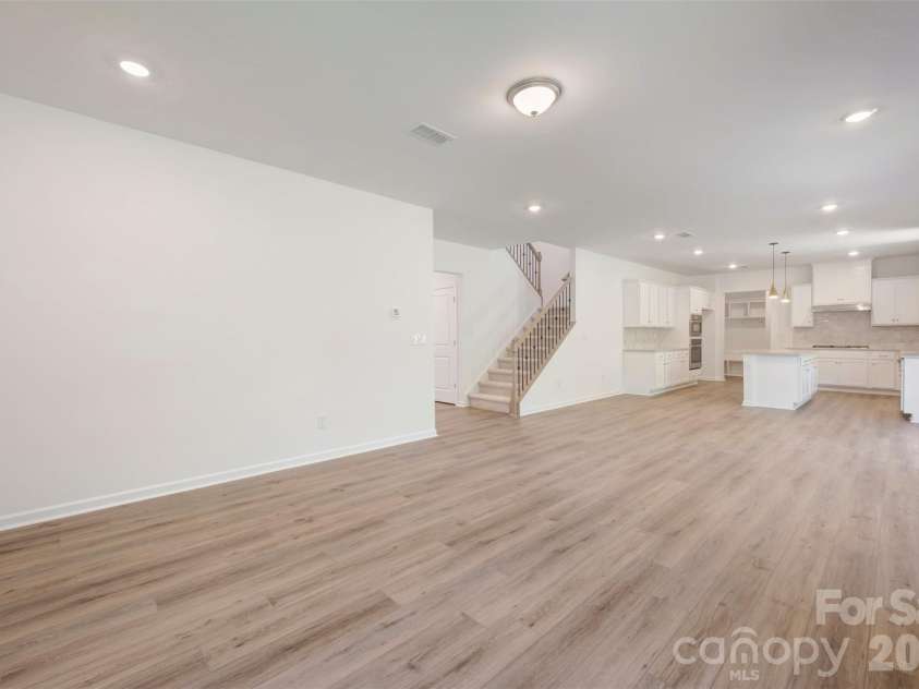 211 Amber Glen Drive, Locust, NC 28217.  MLS# CAR4351400, YatesRealty ID 5578. Family room
