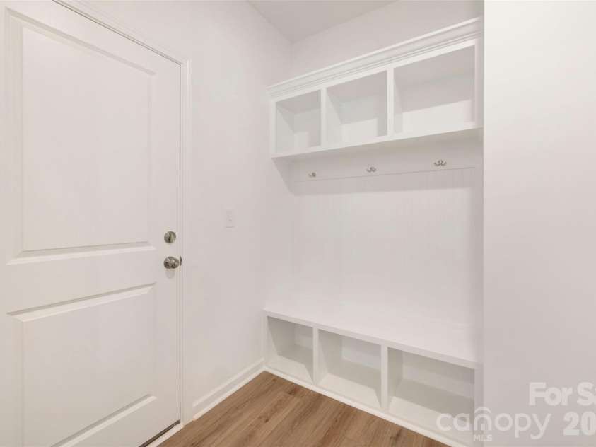 211 Amber Glen Drive, Locust, NC 28217.  MLS# CAR4351400, YatesRealty ID 5578. Garage entrance