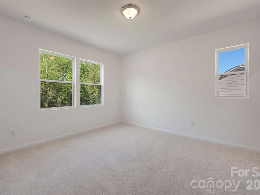 211 Amber Glen Drive, Locust, NC 28217.  MLS# CAR4351400, YatesRealty ID 5578. Secondary bedroom