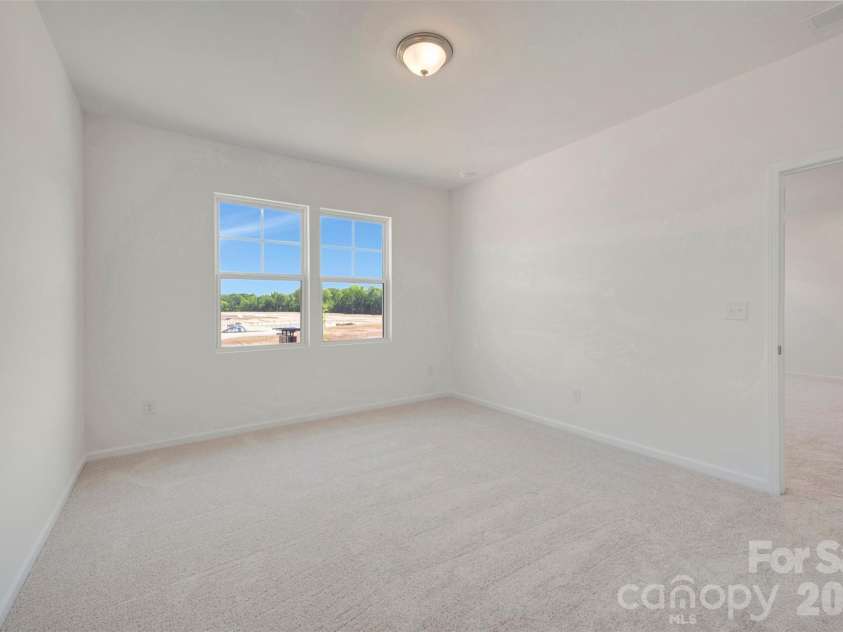 211 Amber Glen Drive, Locust, NC 28217.  MLS# CAR4351400, YatesRealty ID 5578. Secondary bedroom