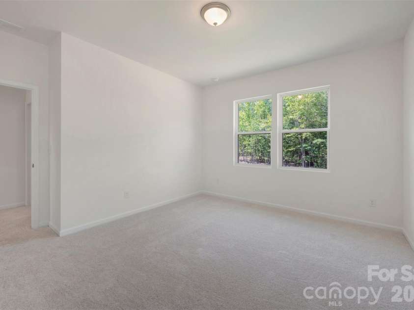 211 Amber Glen Drive, Locust, NC 28217.  MLS# CAR4351400, YatesRealty ID 5578. Secondary bedroom