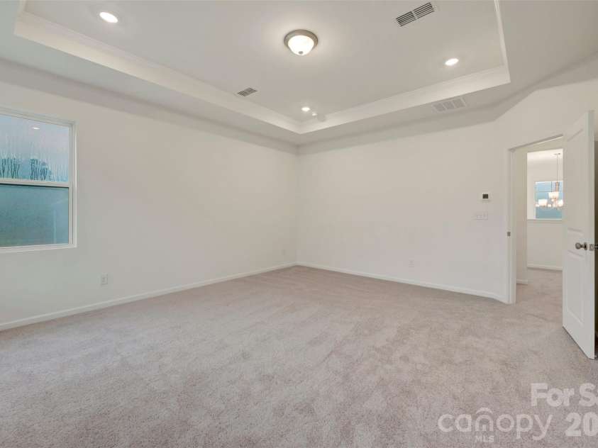 205 Amber Glen Drive, Locust, NC 28217.  MLS# CAR4351647, YatesRealty ID 5579. Owner's suite