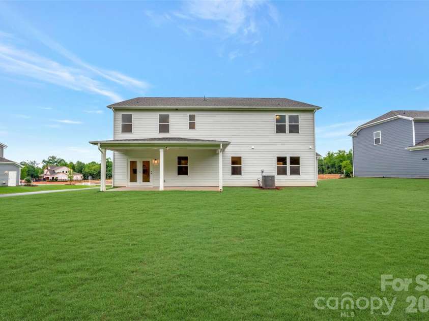 205 Amber Glen Drive, Locust, NC 28217.  MLS# CAR4351647, YatesRealty ID 5579. Rear exterior