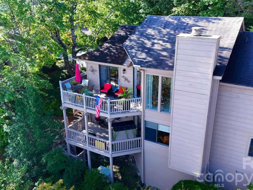 163 Country Ridge Road, Hendersonville, NC 28739.  MLS# CAR4432394, YatesRealty ID 55804. Deck off each level