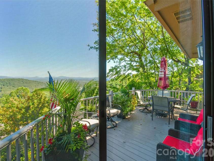 163 Country Ridge Road, Hendersonville, NC 28739.  MLS# CAR4432394, YatesRealty ID 55804. Deck with view