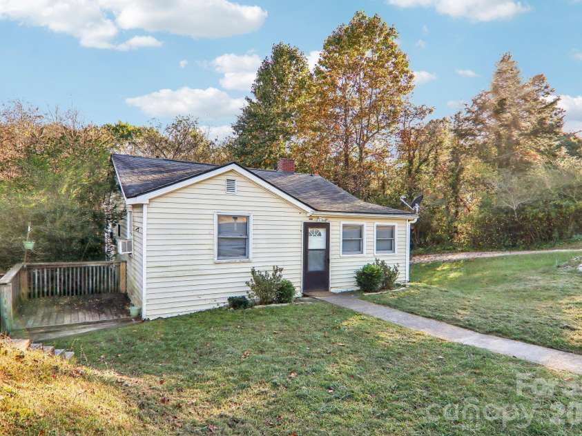 1991 & 1993 Plott Creek Road, Waynesville, NC 28786.  MLS# CAR4431420, YatesRealty ID 55805. 