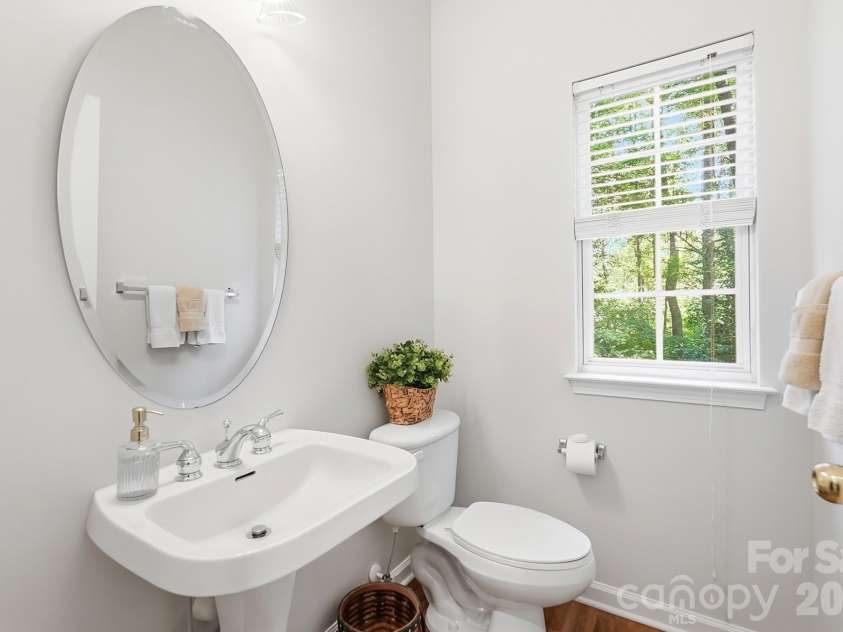 2100 Pineapple Court, Matthews, NC 28105.  MLS# CAR4431286, YatesRealty ID 55807. Half Bath on the main