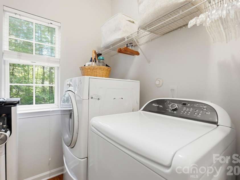 2100 Pineapple Court, Matthews, NC 28105.  MLS# CAR4431286, YatesRealty ID 55807. Laundry on the main