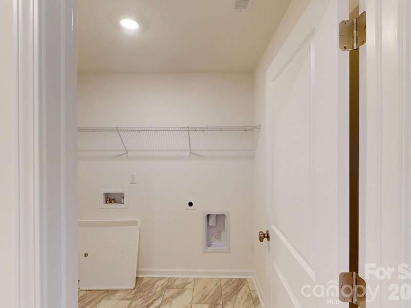 1022 Overbrook Place, Wingate, NC 28174.  MLS# CAR4355301, YatesRealty ID 5581. Laundry room