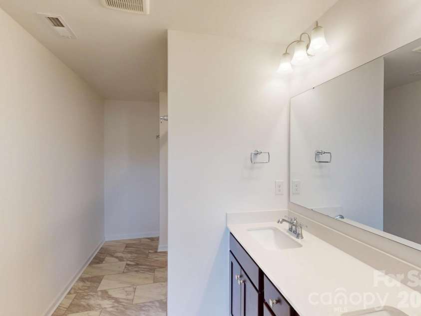 1022 Overbrook Place, Wingate, NC 28174.  MLS# CAR4355301, YatesRealty ID 5581. Owner's bathroom
