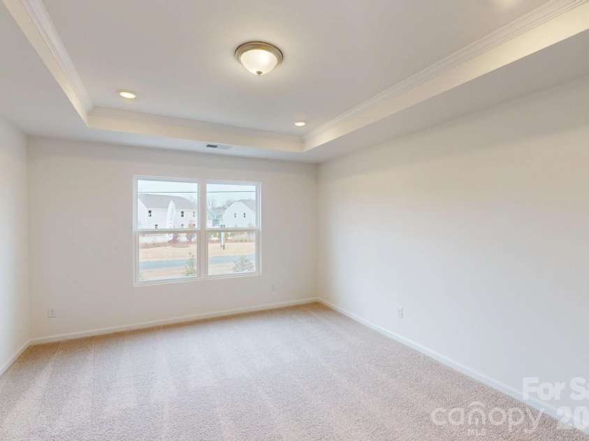 1022 Overbrook Place, Wingate, NC 28174.  MLS# CAR4355301, YatesRealty ID 5581. Owner's bedroom