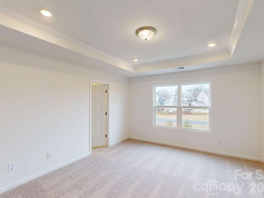 1022 Overbrook Place, Wingate, NC 28174.  MLS# CAR4355301, YatesRealty ID 5581. Owner's bedroom
