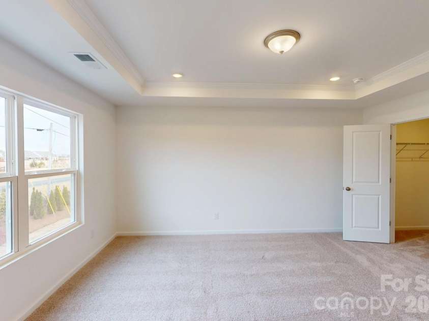 1022 Overbrook Place, Wingate, NC 28174.  MLS# CAR4355301, YatesRealty ID 5581. Owner's bedroom