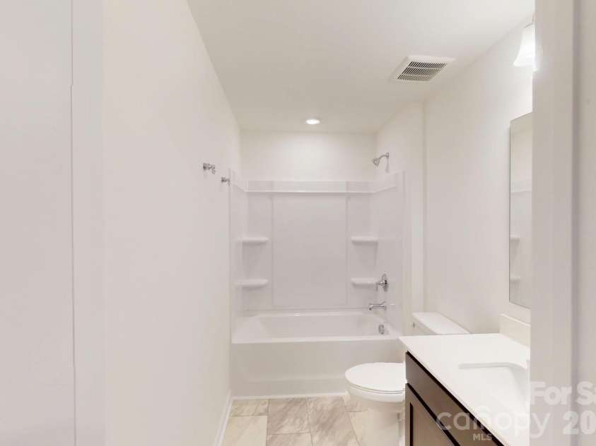 1022 Overbrook Place, Wingate, NC 28174.  MLS# CAR4355301, YatesRealty ID 5581. Secondary bathroom