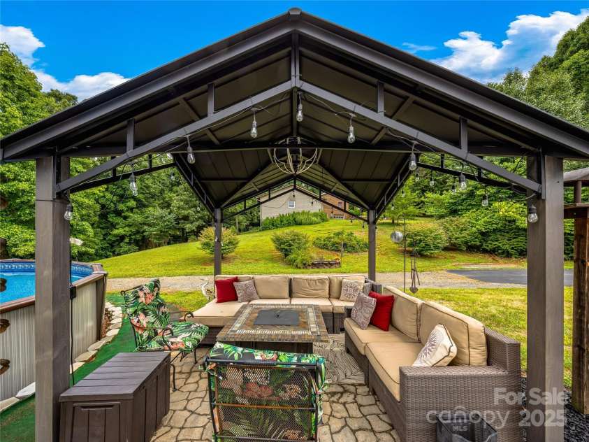 265 Flat Creek Church Road, Weaverville, NC 28787.  MLS# CAR4241685, YatesRealty ID 5581. Ample entertaining spaces