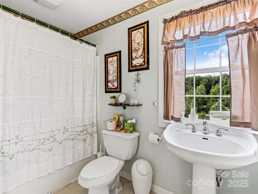 265 Flat Creek Church Road, Weaverville, NC 28787.  MLS# CAR4241685, YatesRealty ID 5581. Upstairs Bathroom