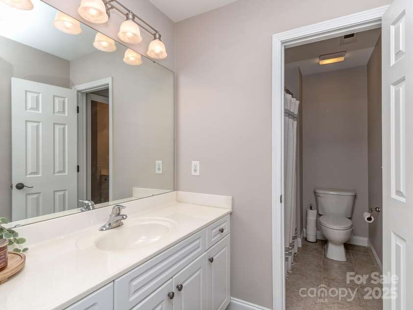 1009 Summer Creste Drive, Indian Trail, NC 28079.  MLS# CAR4241045, YatesRealty ID 5582. Full bath upstairs with separate shower/WC