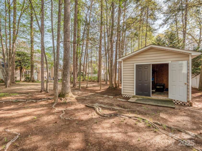 1009 Summer Creste Drive, Indian Trail, NC 28079.  MLS# CAR4241045, YatesRealty ID 5582. Large two sided shed