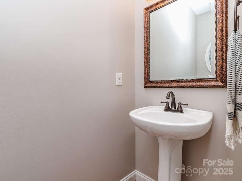 1009 Summer Creste Drive, Indian Trail, NC 28079.  MLS# CAR4241045, YatesRealty ID 5582. Main floor powder room