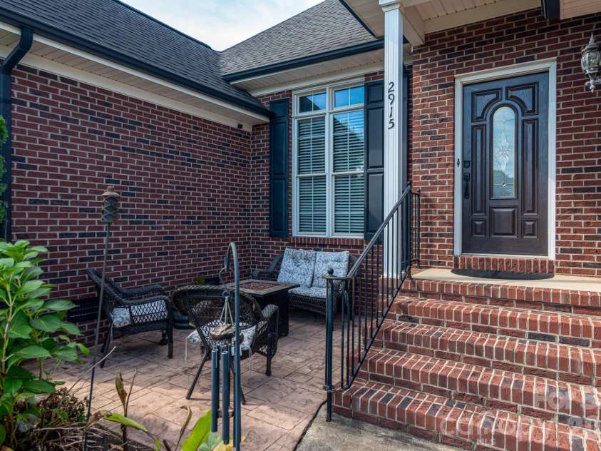 2915 Woodfield Lane, Lincolnton, NC 28092.  MLS# CAR4432025, YatesRealty ID 55823. Cozy patio in front!