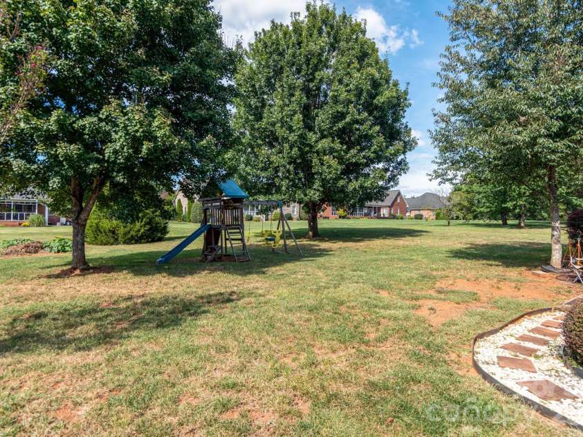 2915 Woodfield Lane, Lincolnton, NC 28092.  MLS# CAR4432025, YatesRealty ID 55823. Large level yard.