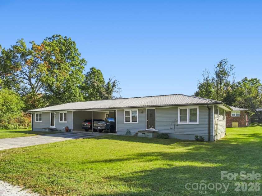 17 Randolph Avenue, Flat Rock, NC 28731.  MLS# CAR4428296, YatesRealty ID 55829. Duplex on Randolph Ave