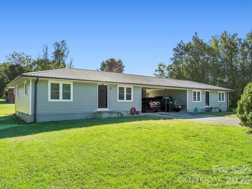 17 Randolph Avenue, Flat Rock, NC 28731.  MLS# CAR4428296, YatesRealty ID 55829. Duplex on Randolph Ave