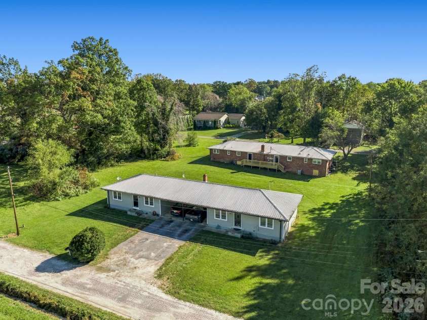 17 Randolph Avenue, Flat Rock, NC 28731.  MLS# CAR4428296, YatesRealty ID 55829. Duplex on Randolph Ave