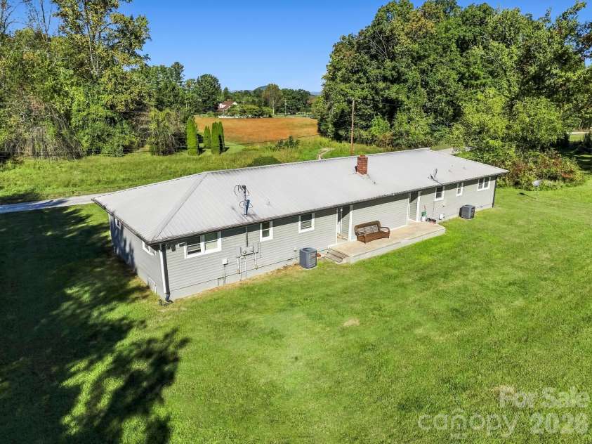 17 Randolph Avenue, Flat Rock, NC 28731.  MLS# CAR4428296, YatesRealty ID 55829. Duplex on Randolph Ave