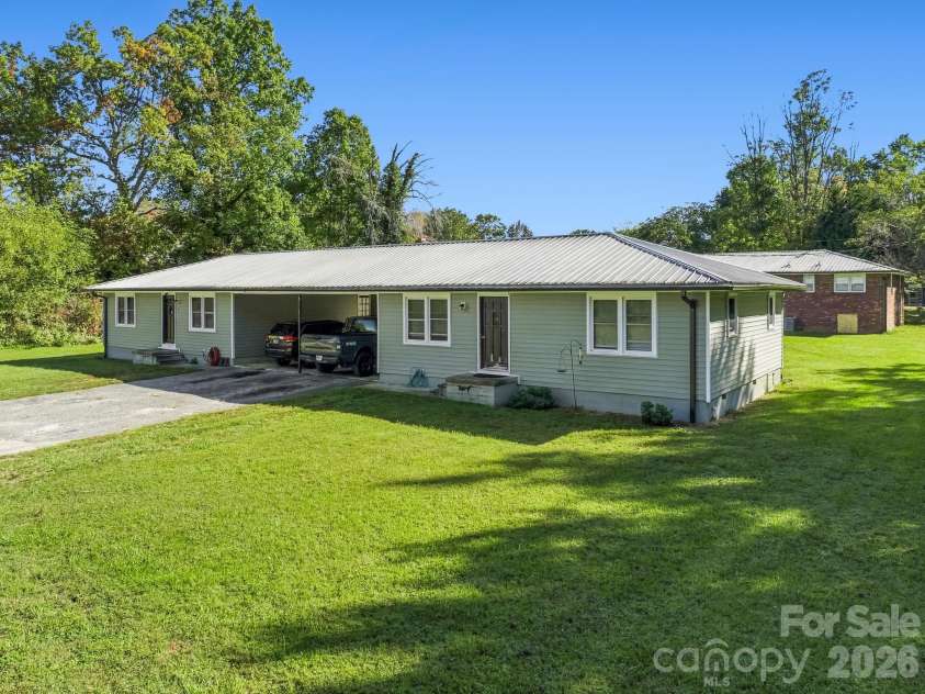 17 Randolph Avenue, Flat Rock, NC 28731.  MLS# CAR4428296, YatesRealty ID 55829. Duplex on Randolph Ave