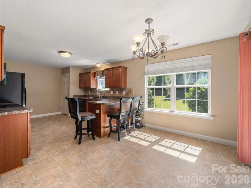 202 Hondah Road, Brevard, NC 28712.  MLS# CAR4432866, YatesRealty ID 55847. 