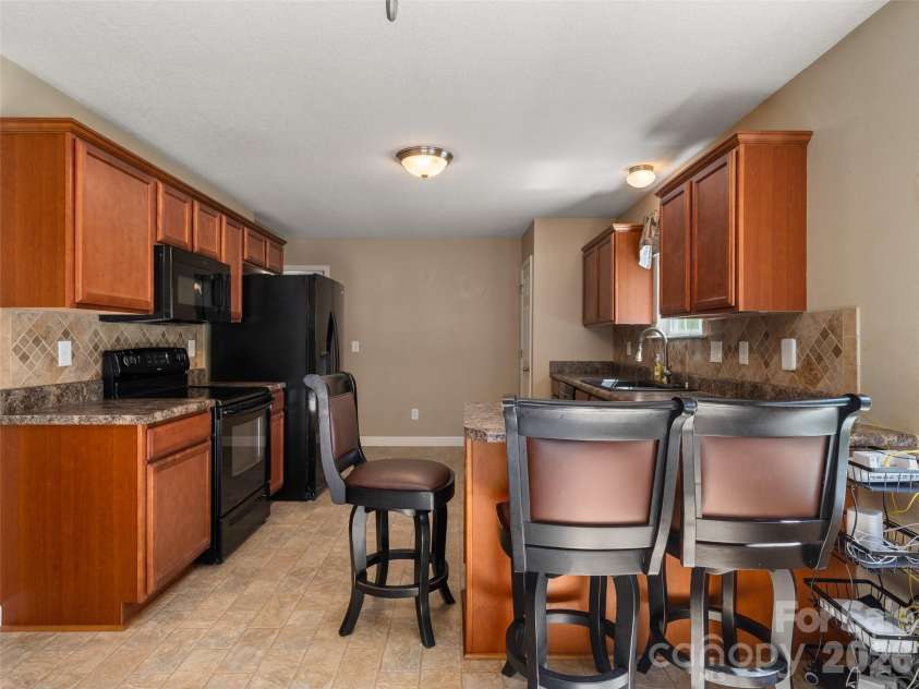 202 Hondah Road, Brevard, NC 28712.  MLS# CAR4432866, YatesRealty ID 55847. 