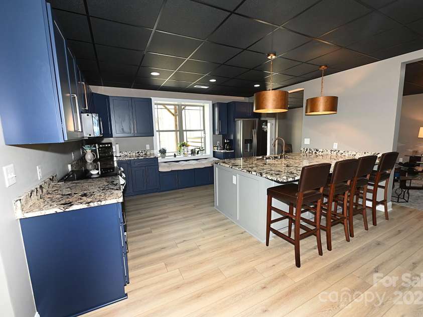 2757 Trent Drive, Conover, NC 28613.  MLS# CAR4318412, YatesRealty ID 5585. Basement Kitchen