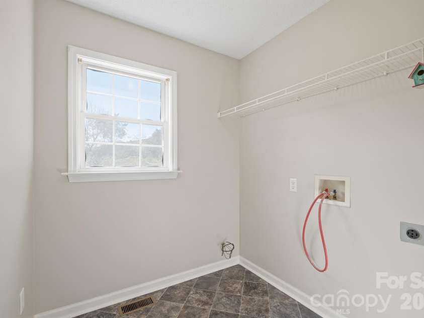 1061 Isenhour Court, Maiden, NC 28650.  MLS# CAR4432470, YatesRealty ID 55851. Laundry room
