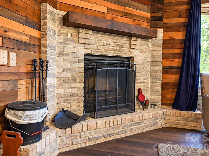 3576 Julian Welborn Drive, Morganton, NC 28655.  MLS# CAR4432882, YatesRealty ID 55852. Beautiful fireplace