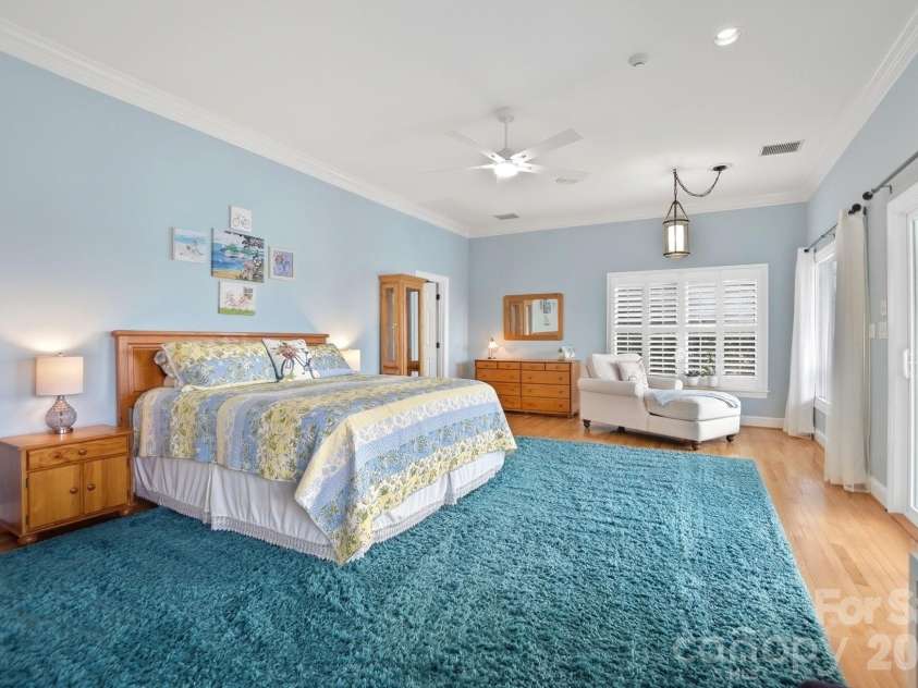 18212 Tayport Drive, Charlotte, NC 28278.  MLS# CAR4346978, YatesRealty ID 5586. Private 2nd floor primary suite with cedar walk-in closet, heated bath floors, soaking tub, heated towel rack, and private porch