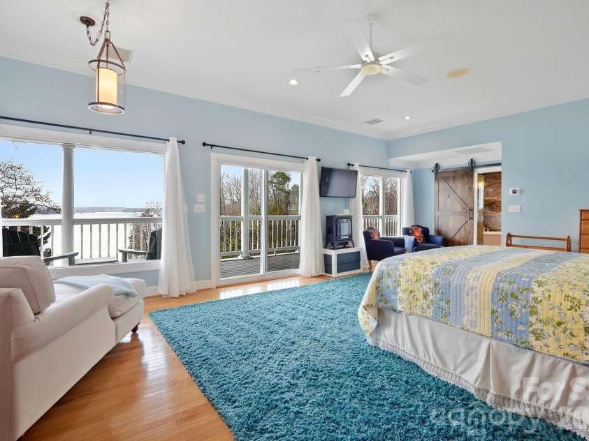 18212 Tayport Drive, Charlotte, NC 28278.  MLS# CAR4346978, YatesRealty ID 5586. Wake each morning to panoramic water views and timeless Southern architecture meets modern luxury
