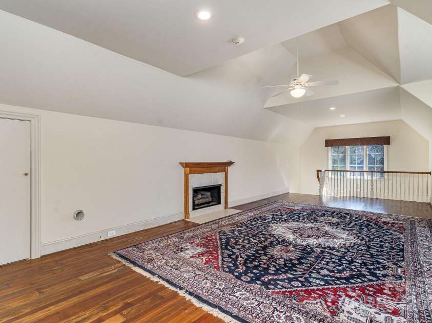 20711 Bethel Church Road, Cornelius, NC 28031.  MLS# CAR4225782, YatesRealty ID 5586. Carriage house with fireplace over garage